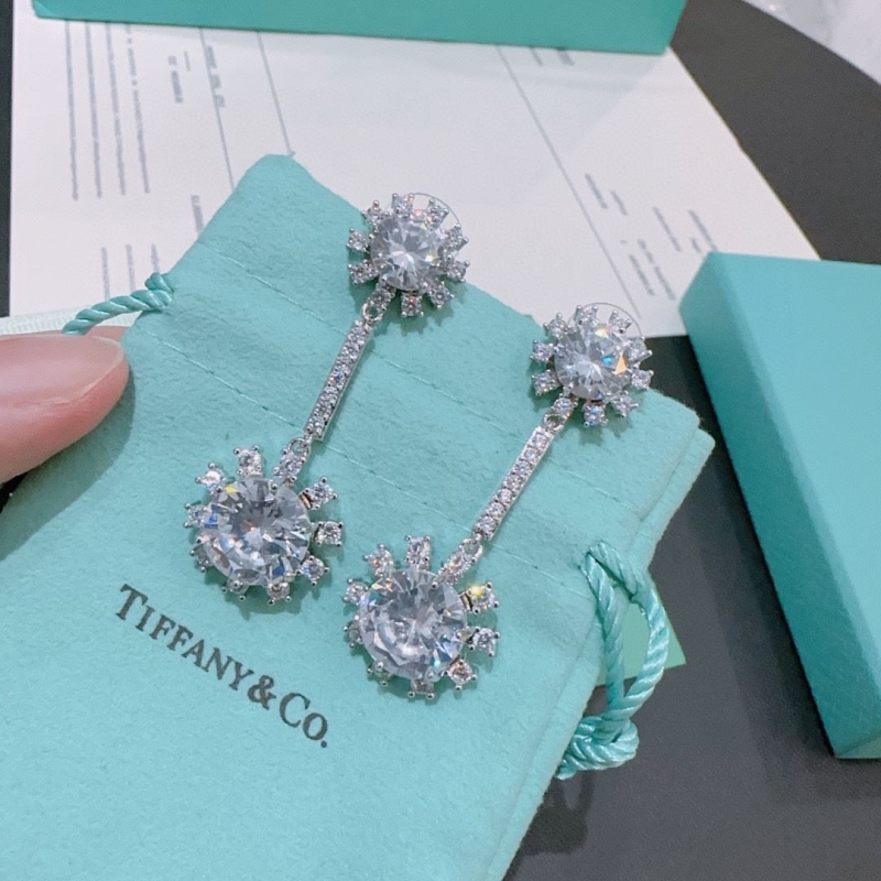 T*f*ny earrings